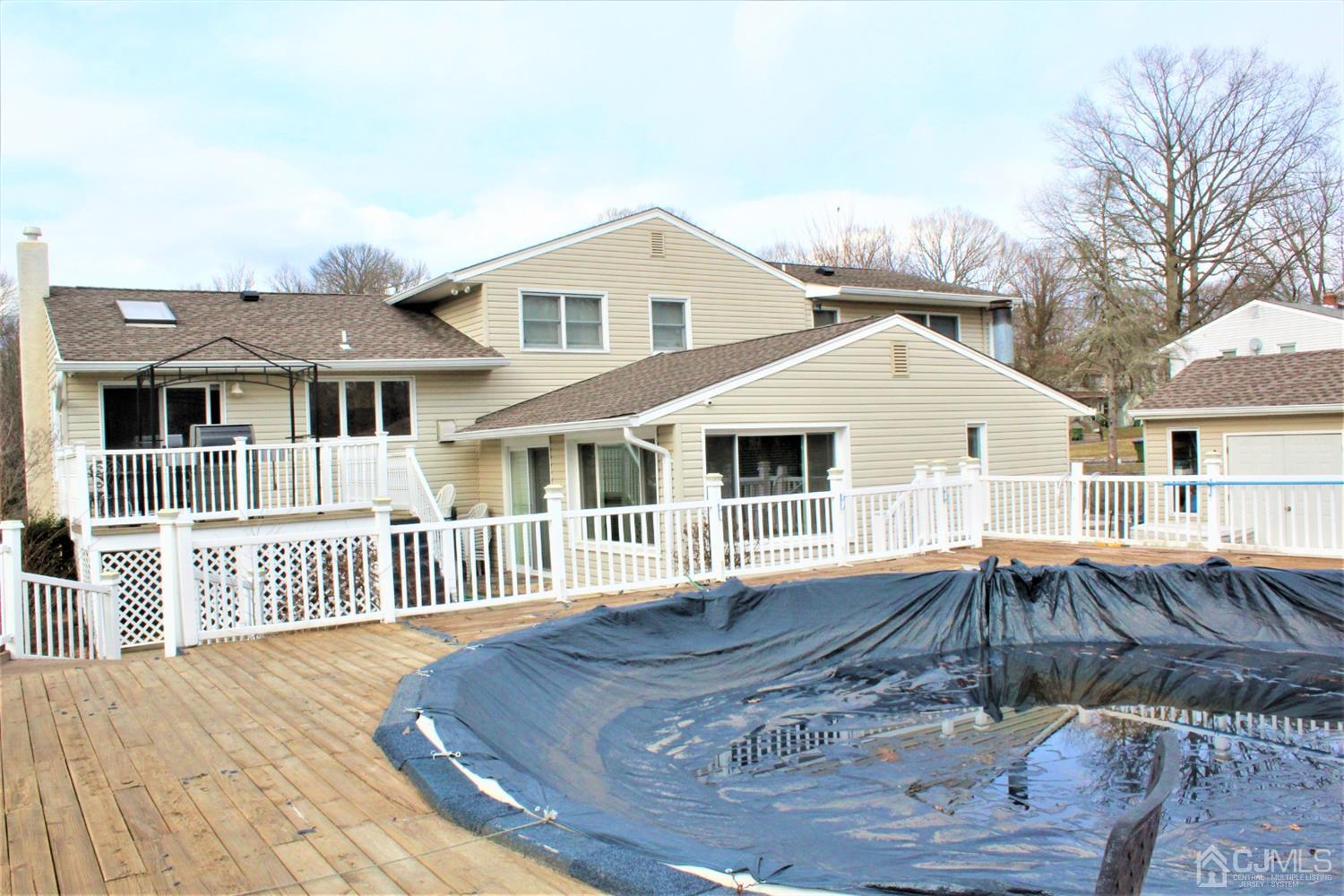 10 Fishel Road Edison, NJ 08820 - Photo 5 of 11 a front view of a house with a porch