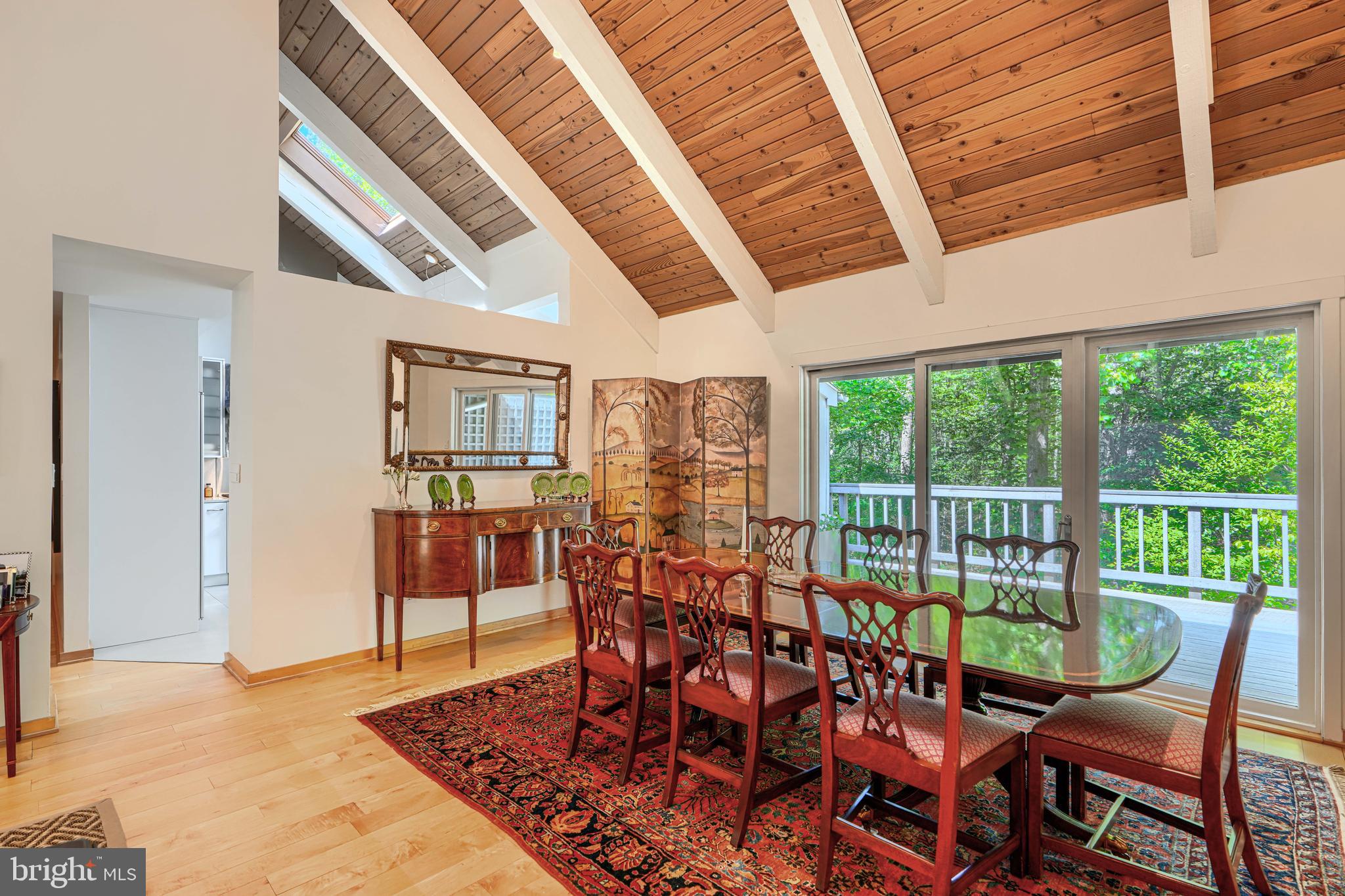 2504 Stone Mill Road Baltimore, MD 21208 - Photo 29 of 123 Dining area with access to kitchen and deck