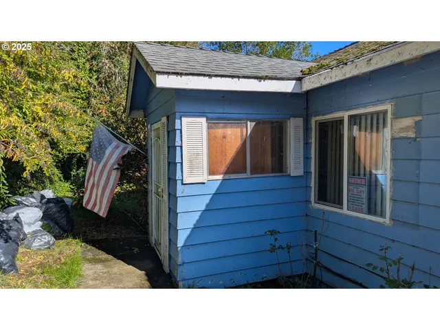 a black and white photo of a house