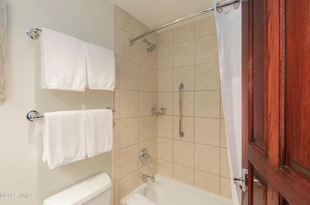 a front view of residential building with balcony