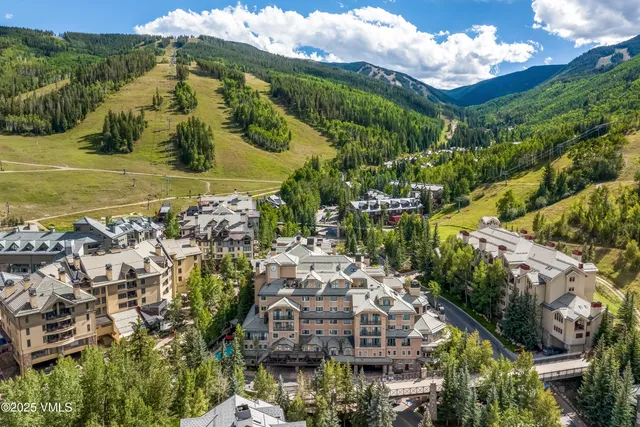 a view of a city with tall buildings