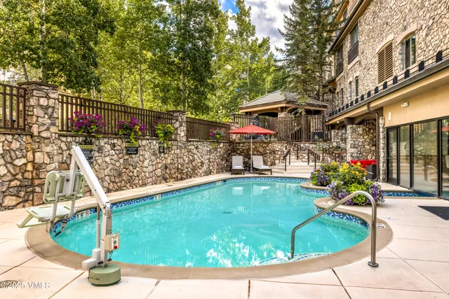 a view of a chairs and tables in the patio