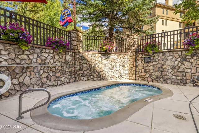 a picture of water heater room with floor to ceiling window