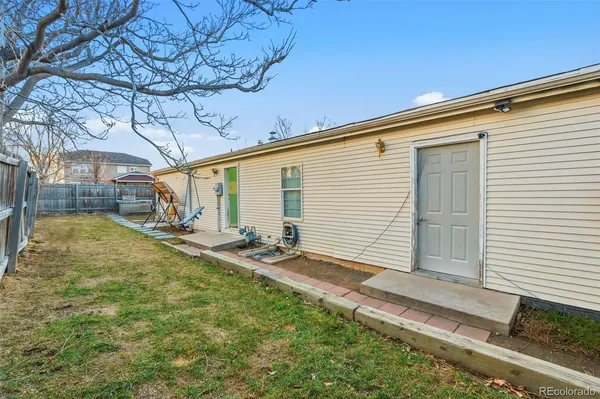 a view of backyard of house