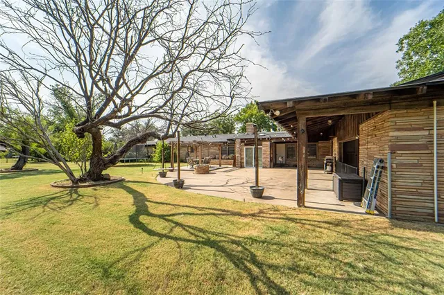 a view of a swimming pool with an outdoor space