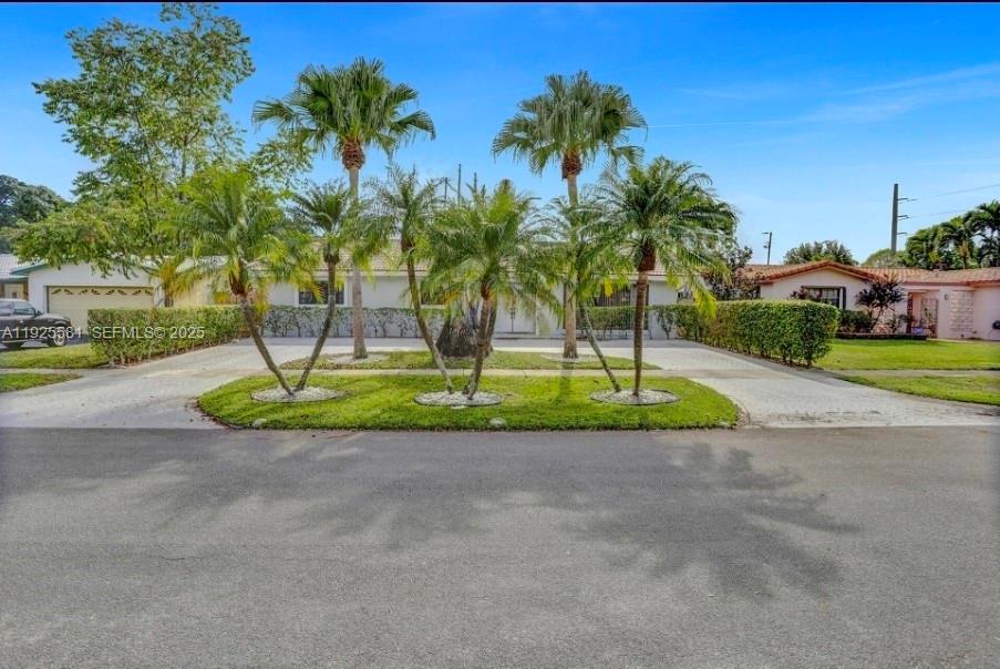 5500 Buchanan Street Hollywood, FL 33021 - Photo 2 of 24 a view of a park with a slide