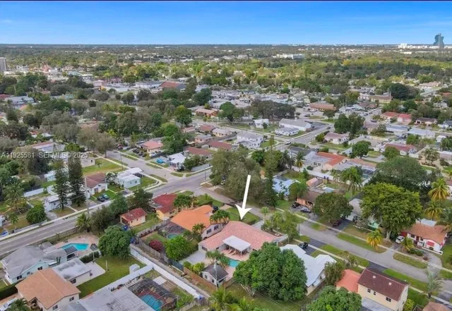 an aerial view of city and lake