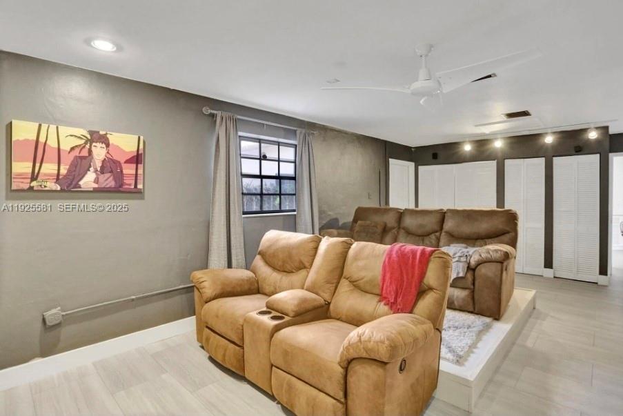 5500 Buchanan Street Hollywood, FL 33021 - Photo 9 of 24 a living room with furniture and window