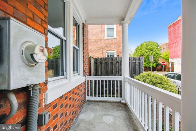 a view of a house with a large window