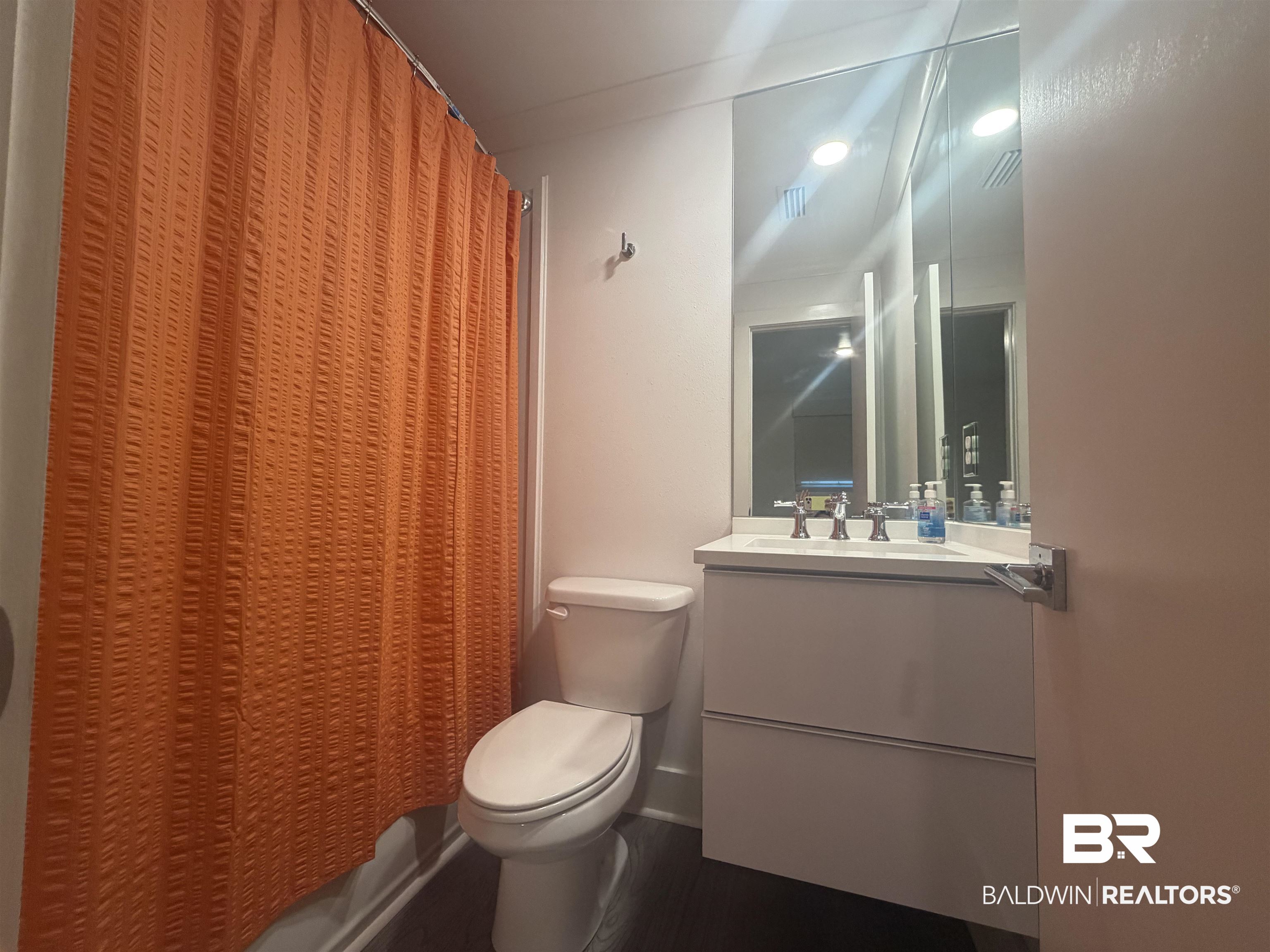 3655 Old Shell Road, Unit 219 Mobile, AL 36608 - Photo 12 of 25 Bathroom with vanity and toilet