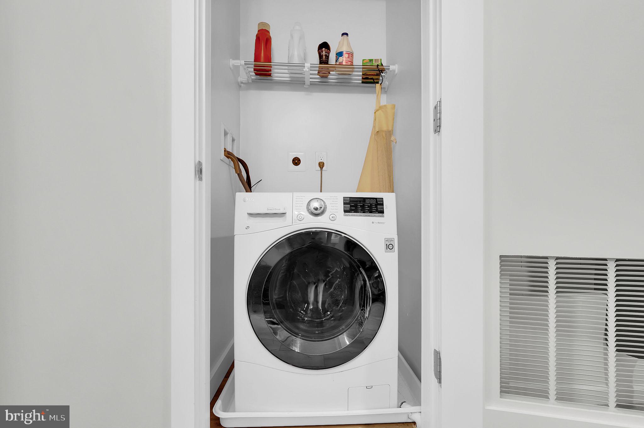 700 Roeder Road, Unit 101 Silver Spring, MD 20910 - Photo 12 of 16 a utility room with dryer and washer