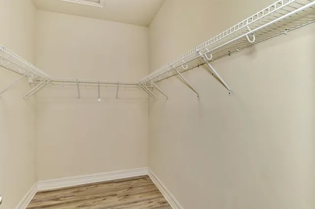 a view of a room with racks on the wall