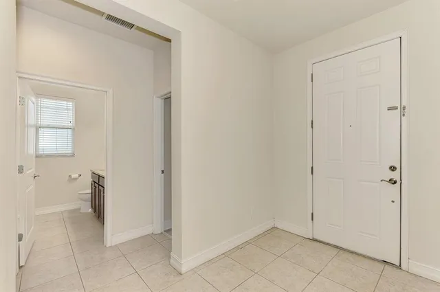 a view of an empty room with a gallery