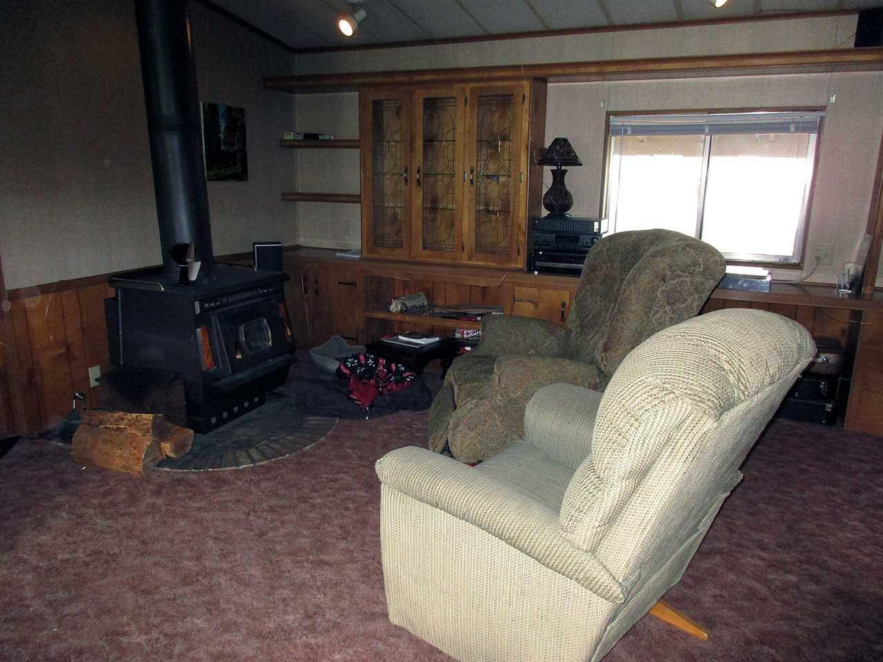 10901 Crystal Springs Road Klamath Falls, OR 97603 - Photo 7 of 21 a living room with furniture and a window