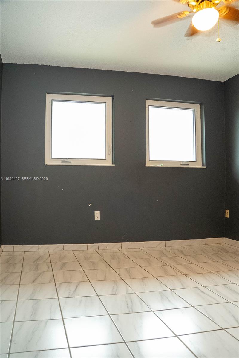 3700 Southwest 139th Avenue Miami, FL 33175 - Photo 19 of 40 a view of an empty room with a window