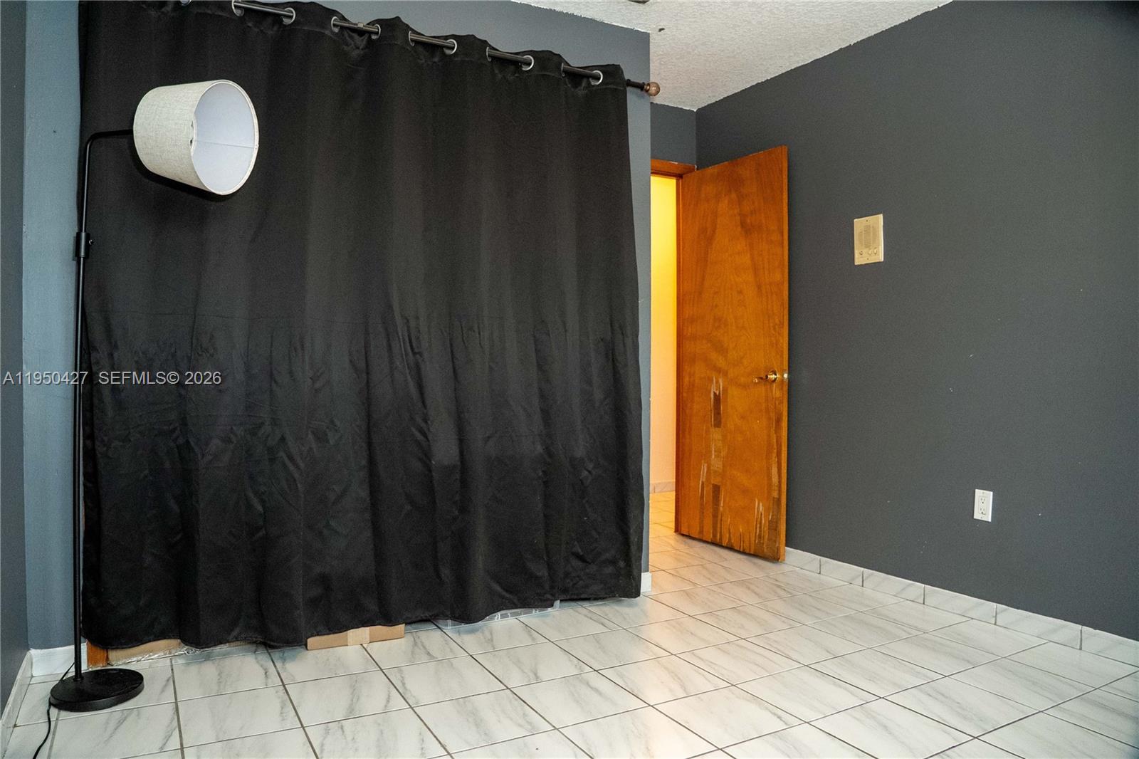 3700 Southwest 139th Avenue Miami, FL 33175 - Photo 20 of 40 a view of entryway with a wooden door