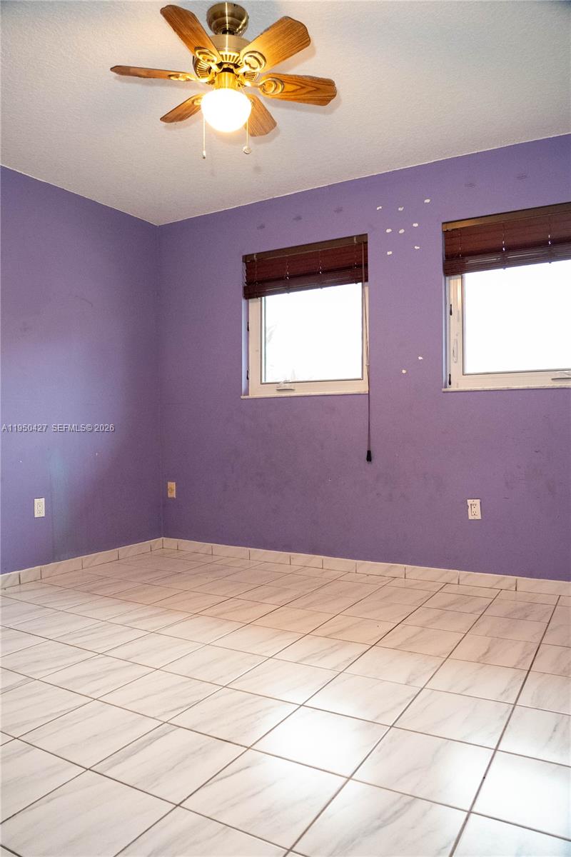 3700 Southwest 139th Avenue Miami, FL 33175 - Photo 21 of 40 a view of an empty room with a window