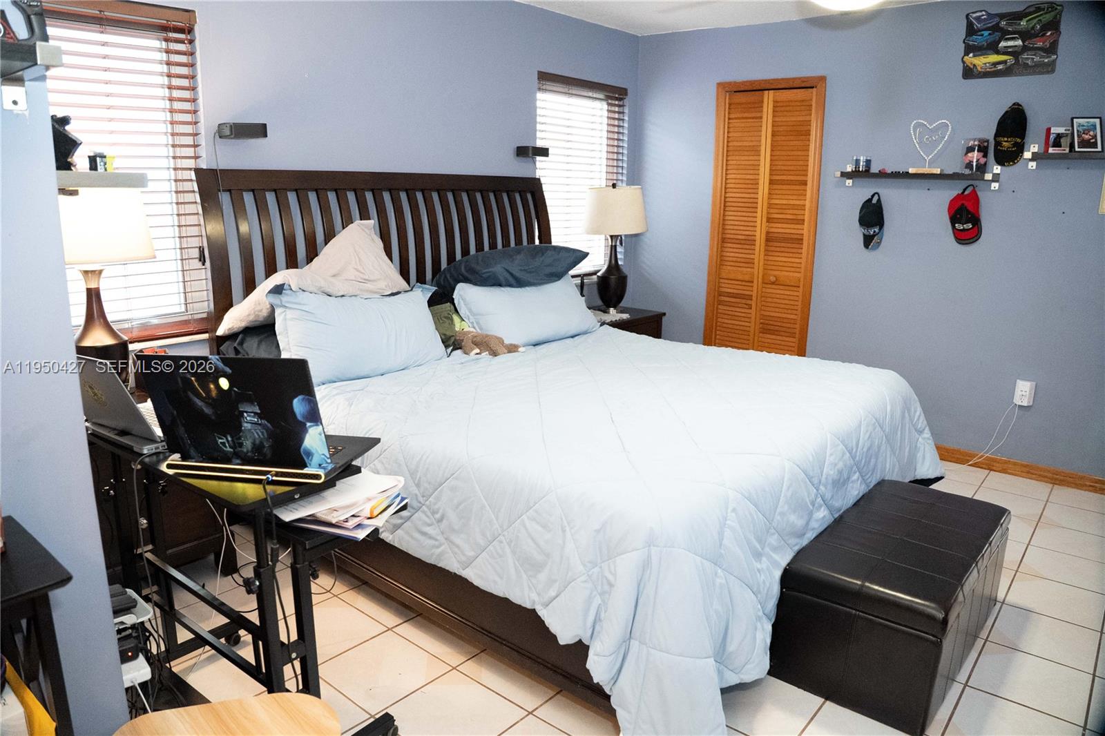 3700 Southwest 139th Avenue Miami, FL 33175 - Photo 25 of 40 a bedroom with a bed and wooden floor