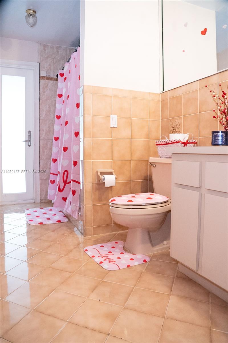 3700 Southwest 139th Avenue Miami, FL 33175 - Photo 28 of 40 a bathroom with a sink toilet and shower