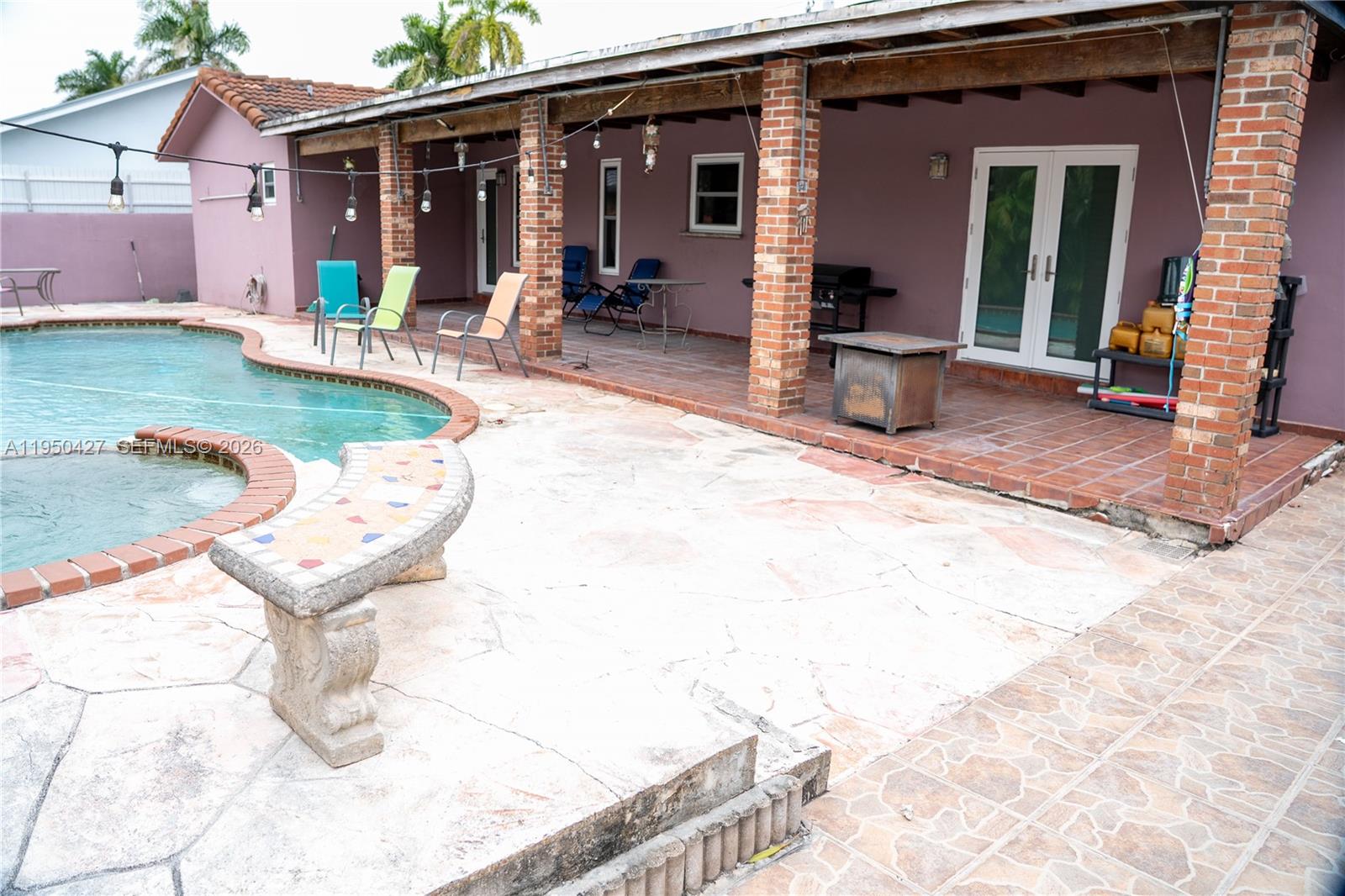 3700 Southwest 139th Avenue Miami, FL 33175 - Photo 37 of 40 a view of a house with backyard outdoor seating area and furniture