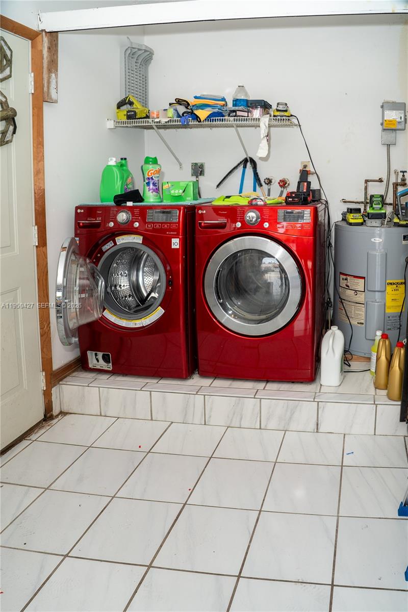 3700 Southwest 139th Avenue Miami, FL 33175 - Photo 40 of 40 a utility room with dryer and washer