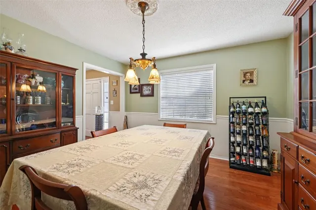 a kitchen with stainless steel appliances granite countertop a sink and stove