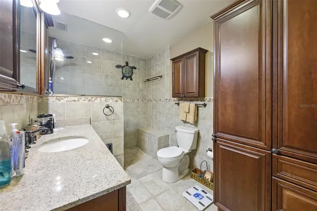 a bed room with a bed and a window