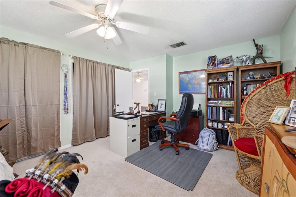 1105 South 9th Street Leesburg, FL 34748 - Photo 37 of 69 a view of a workspace with furniture and toys