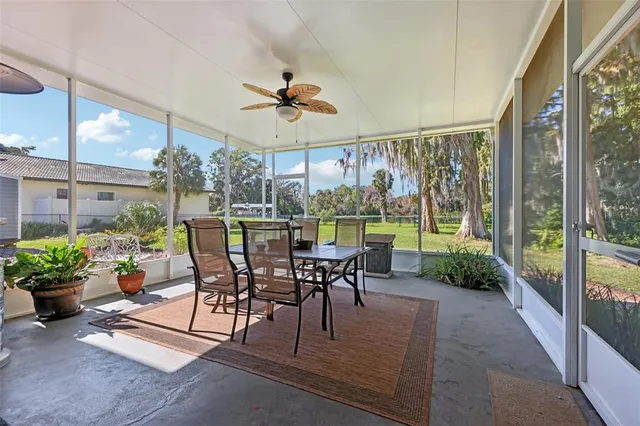 a view of a house with a yard and plants
