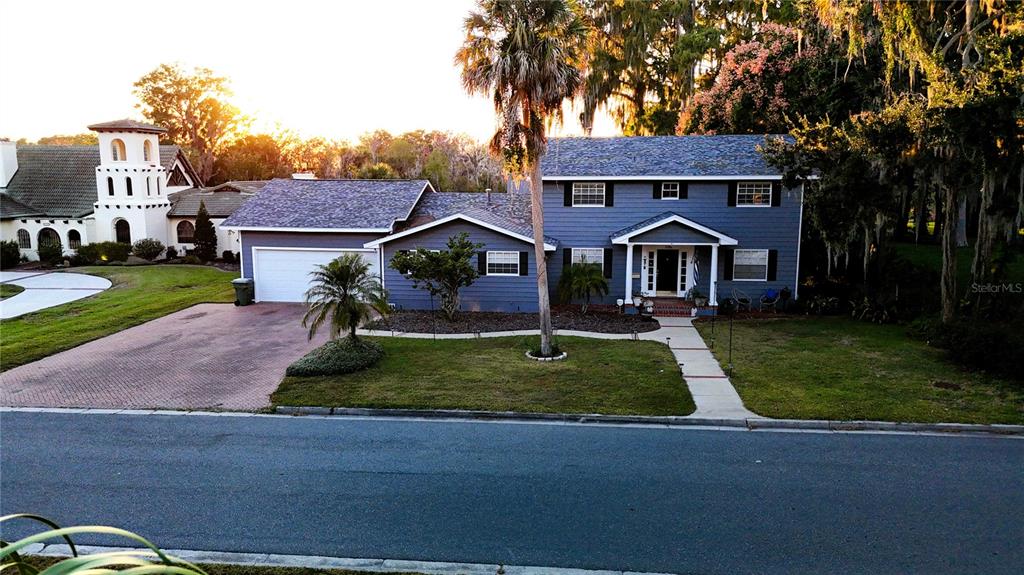 1105 South 9th Street Leesburg, FL 34748 - Photo 61 of 69 front view of a house with a yard