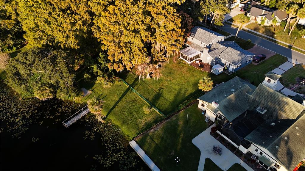1105 South 9th Street Leesburg, FL 34748 - Photo 67 of 69 an aerial view of multiple houses with yard
