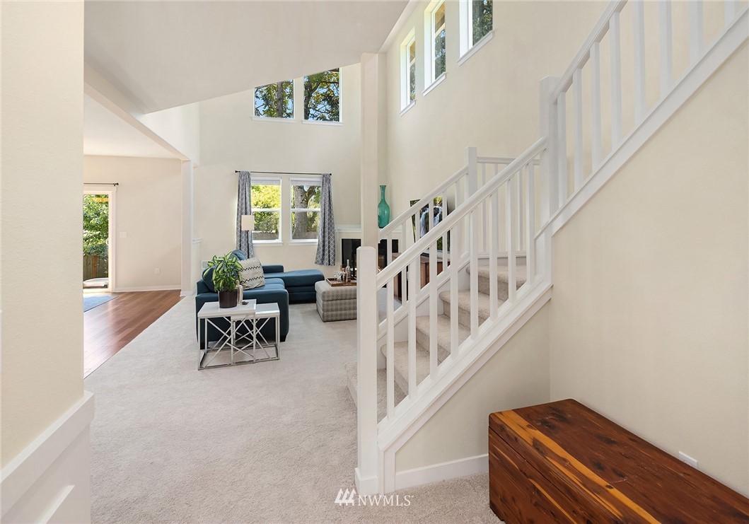 5115 Northeast 6th Place Renton, WA 98059 - Photo 4 of 26 a view of staircase with furniture and a potted plant