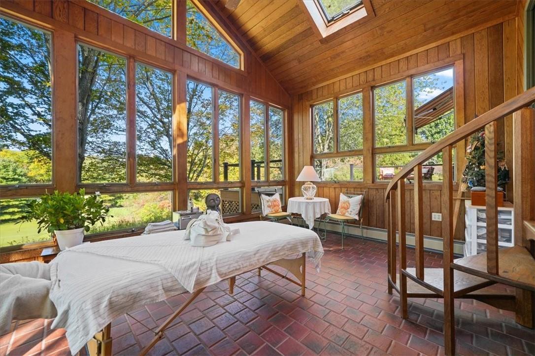 229 Brola Road Middletown, NY 10940 - Photo 1 of 1 a bedroom with furniture and a large window