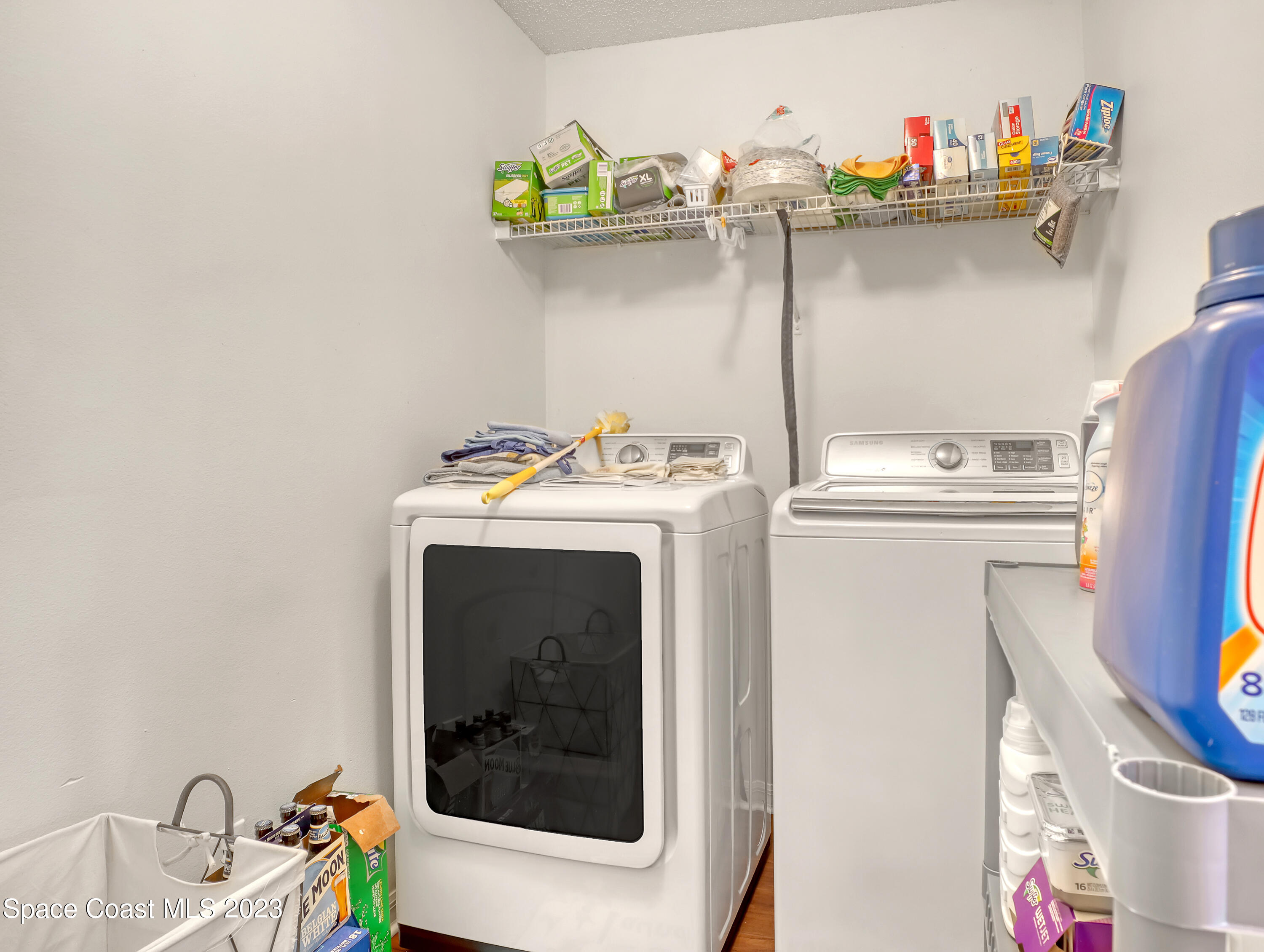 1550 Reed Street Northwest Palm Bay, FL 32907 - Photo 16 of 33 a utility room with dryer and washer
