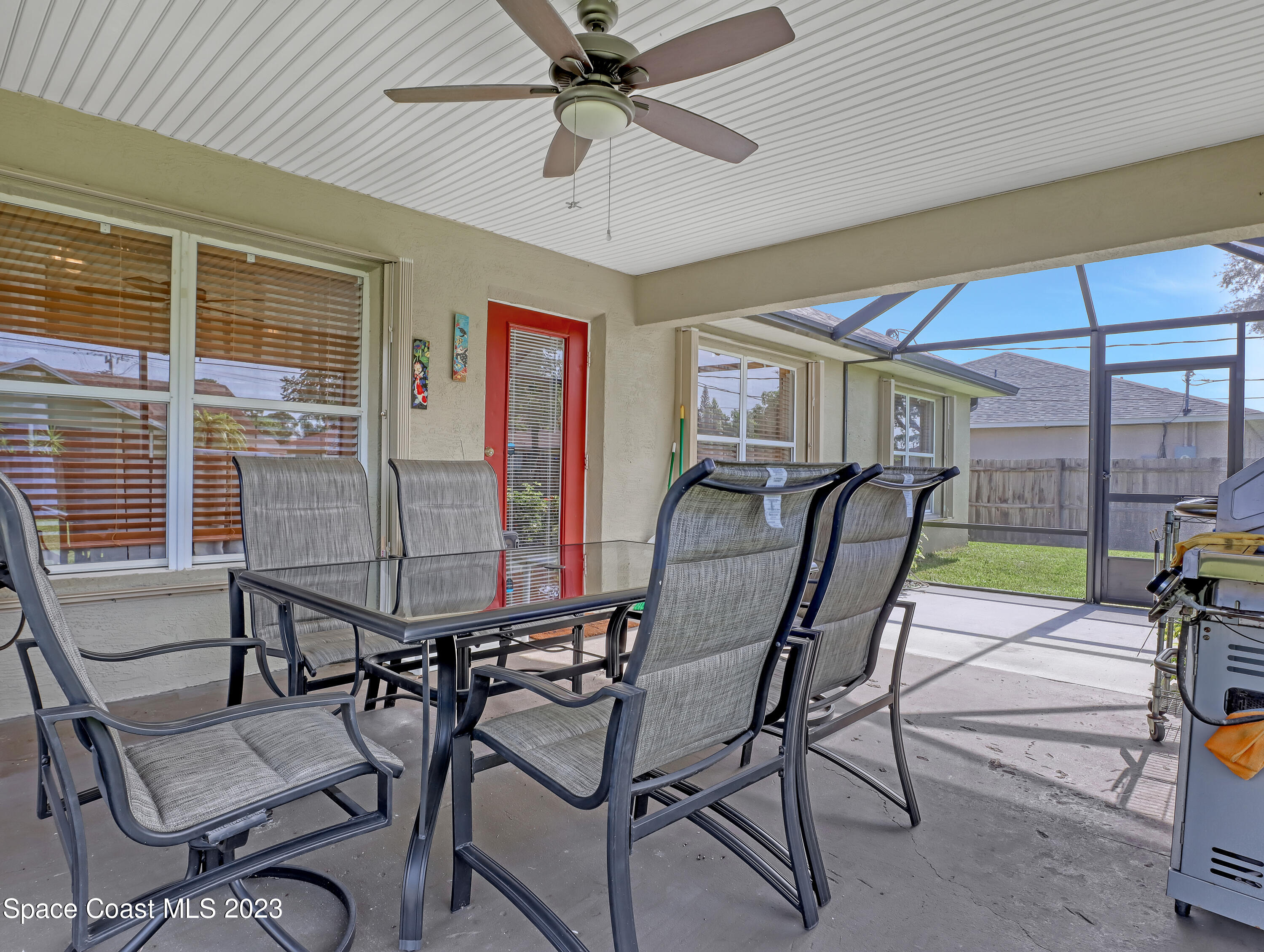 1550 Reed Street Northwest Palm Bay, FL 32907 - Photo 29 of 33 a view of a dining room with furniture window and outside view