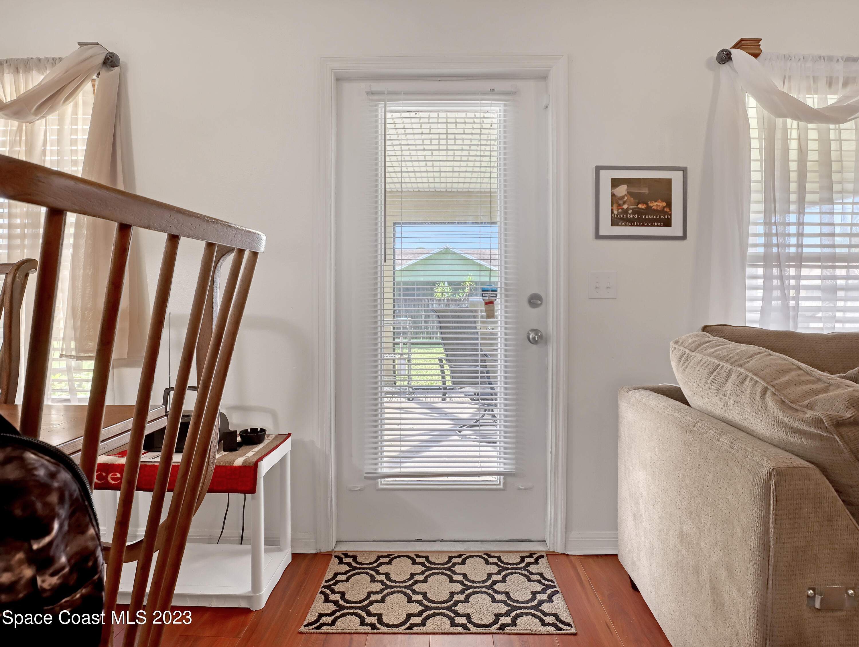 1550 Reed Street Northwest Palm Bay, FL 32907 - Photo 9 of 33 a bedroom with furniture and a window