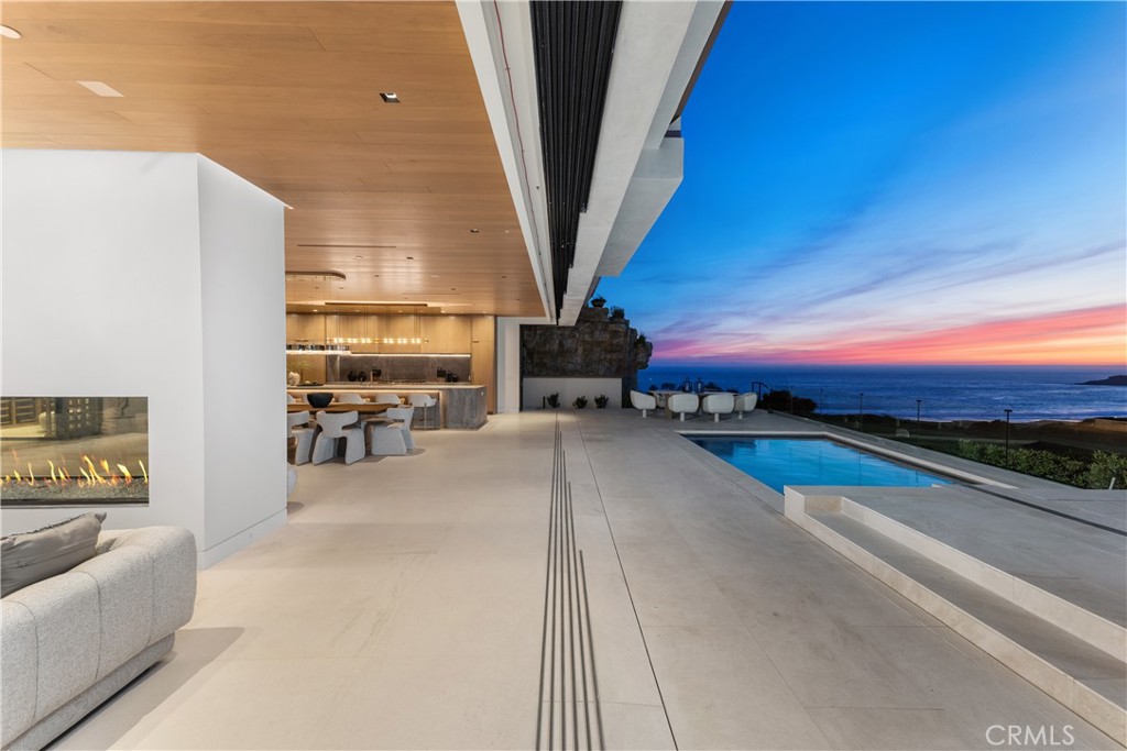 13 Ritz Cove Drive Dana Point, CA 92629 - Photo 1 of 1 a view of swimming pool with outdoor seating and a couch