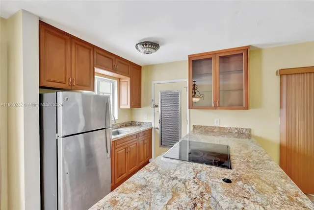 a view of a living room and a porch