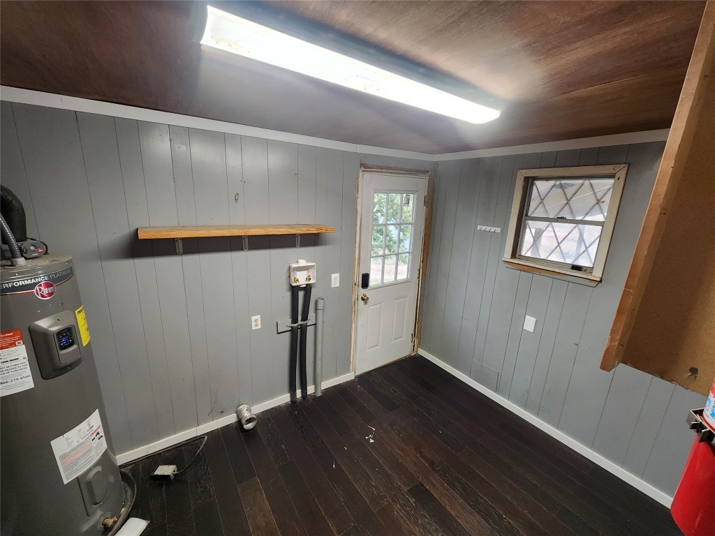 10001 Farm To Market Road 1331 Taylor, TX 76574 - Photo 6 of 10 wooden floor in an empty room with a window