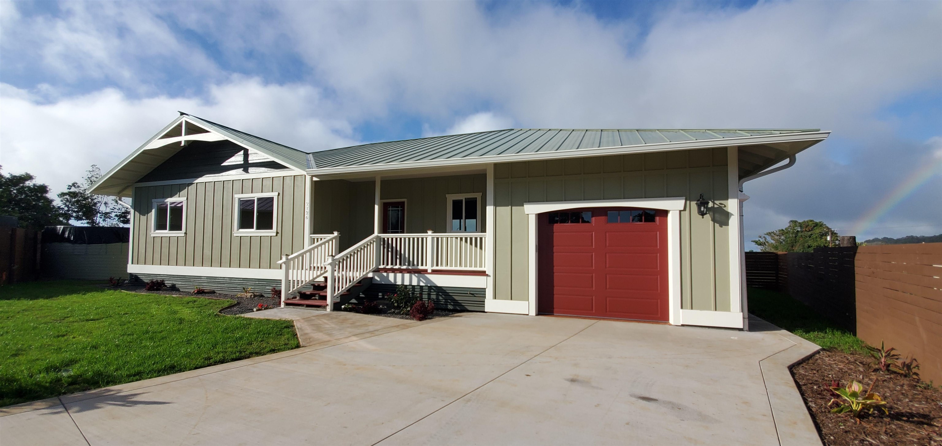 2728 Kaupakalua Road, Unit B Haiku, HI 96708 - Photo 2 of 29 a front view of a house with a yard