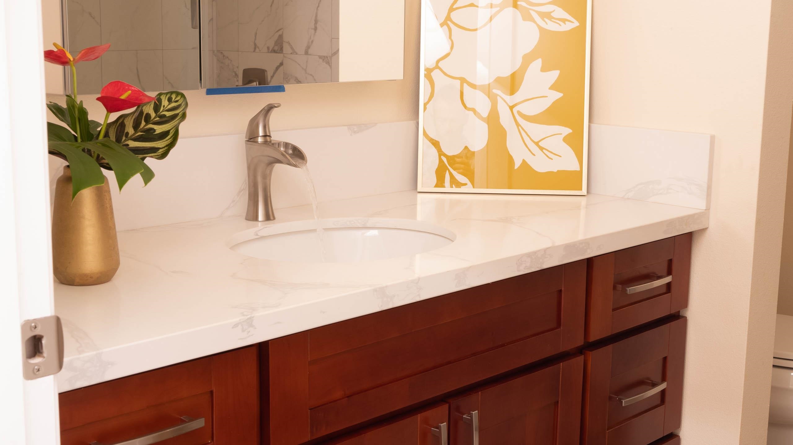 2728 Kaupakalua Road, Unit B Haiku, HI 96708 - Photo 22 of 29 a bathroom with a sink and a mirror