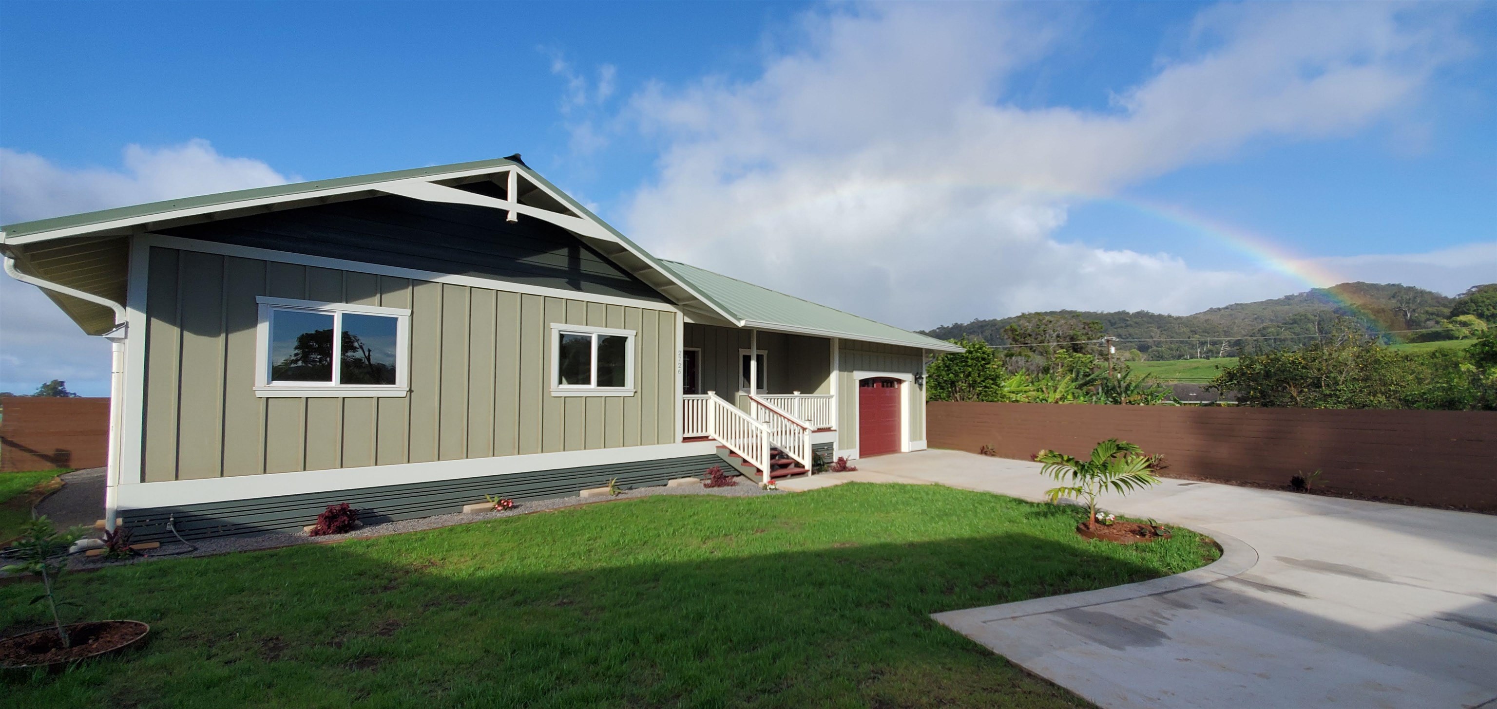 2728 Kaupakalua Road, Unit B Haiku, HI 96708 - Photo 5 of 29 a front view of a house with garden