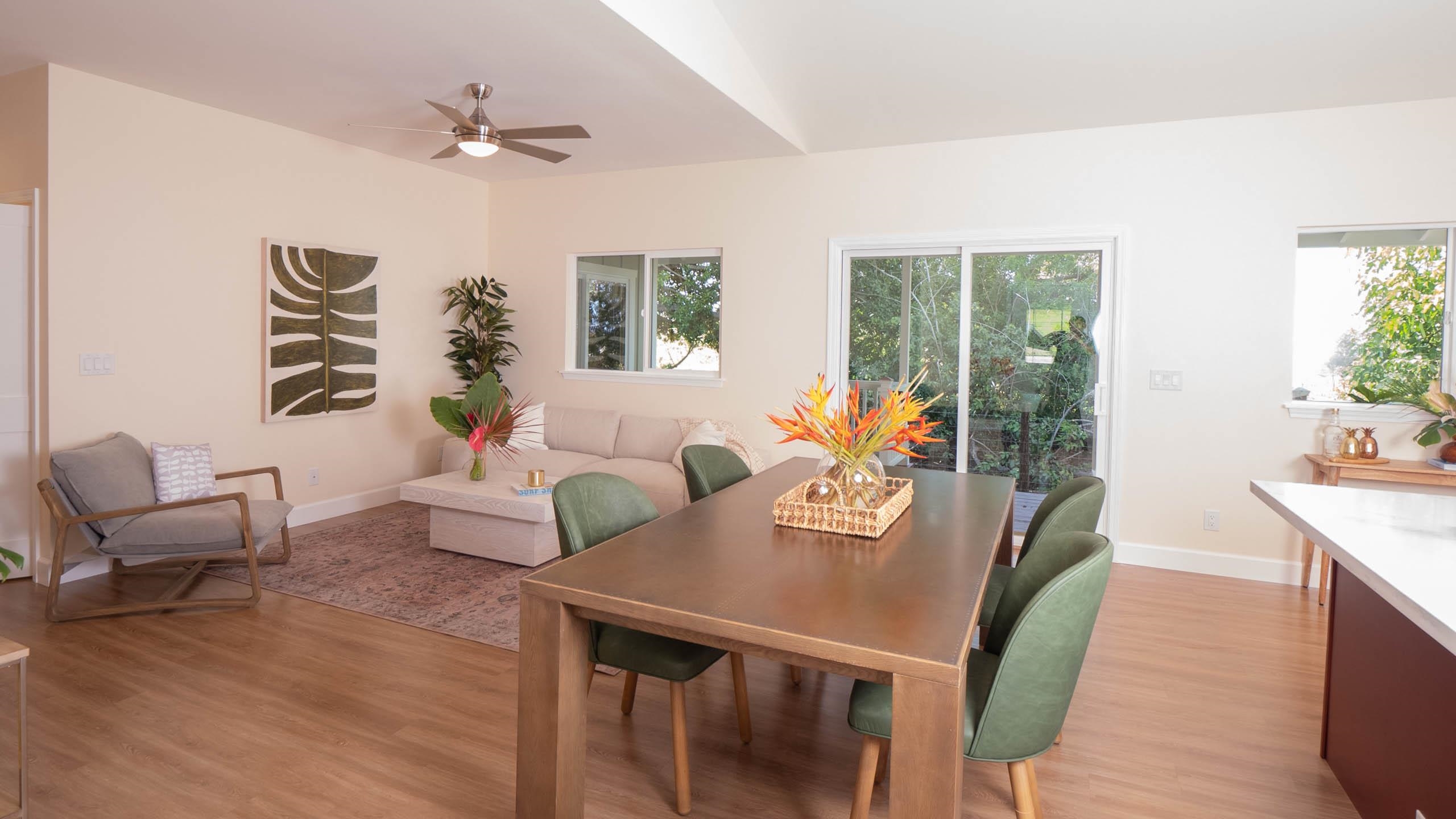 2728 Kaupakalua Road, Unit B Haiku, HI 96708 - Photo 10 of 29 a living room with furniture and a large window