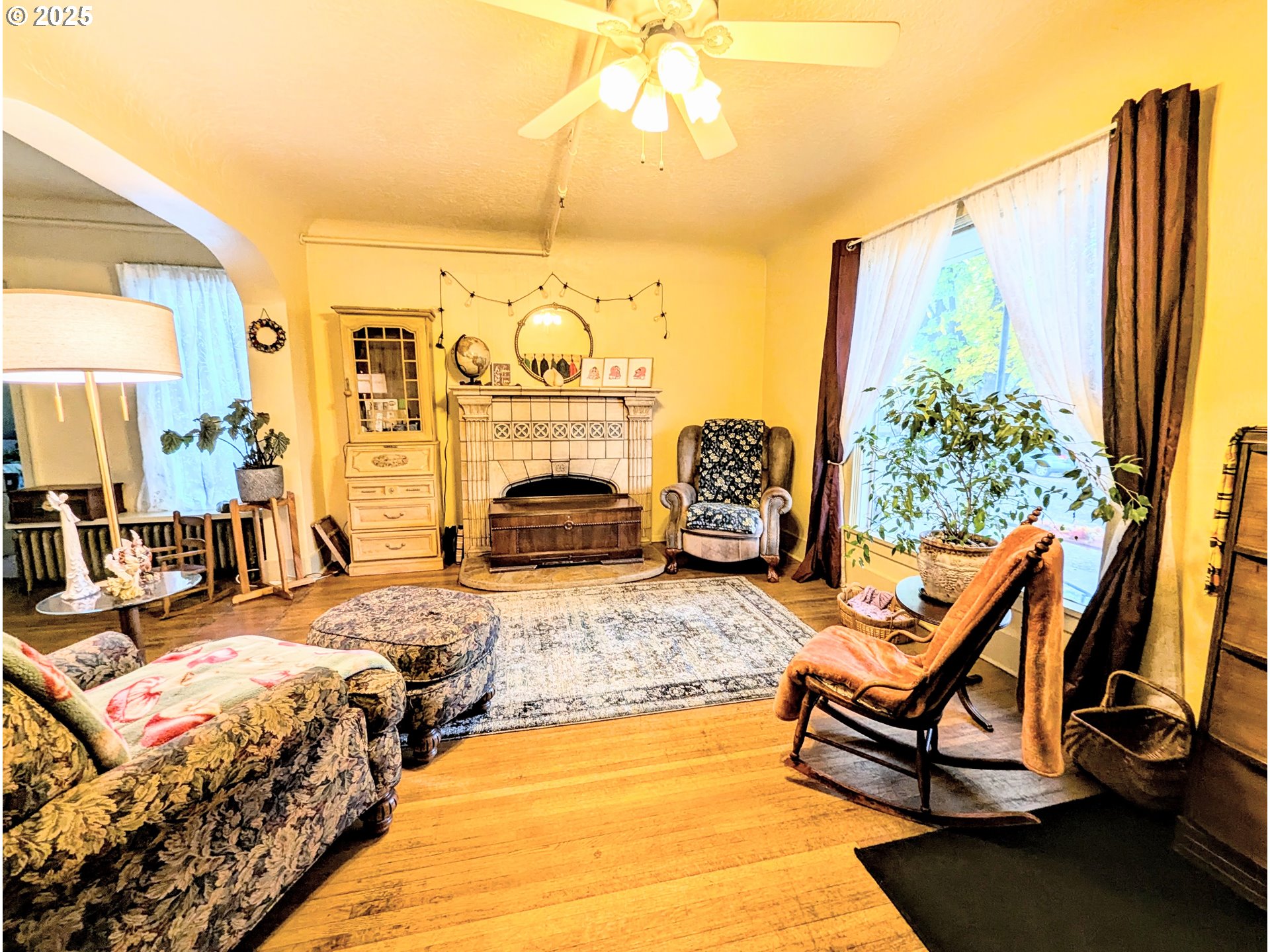 1802 3rd Street La Grande, OR 97850 - Photo 4 of 21 a bedroom with furniture and a large window