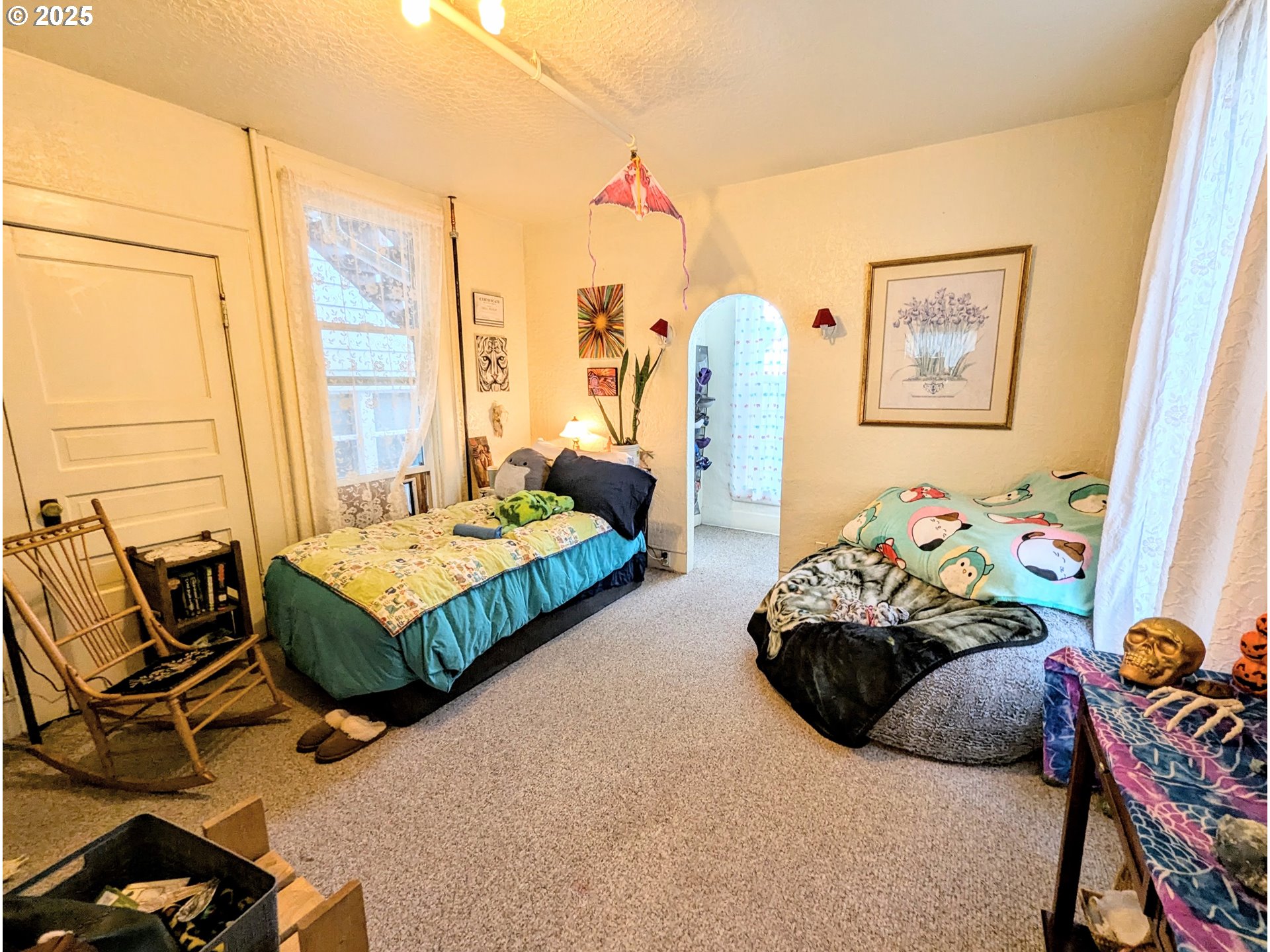 1802 3rd Street La Grande, OR 97850 - Photo 8 of 21 a bedroom with bed and a window