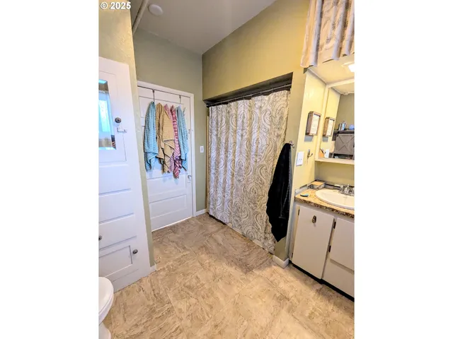 a view of livingroom with furniture and window