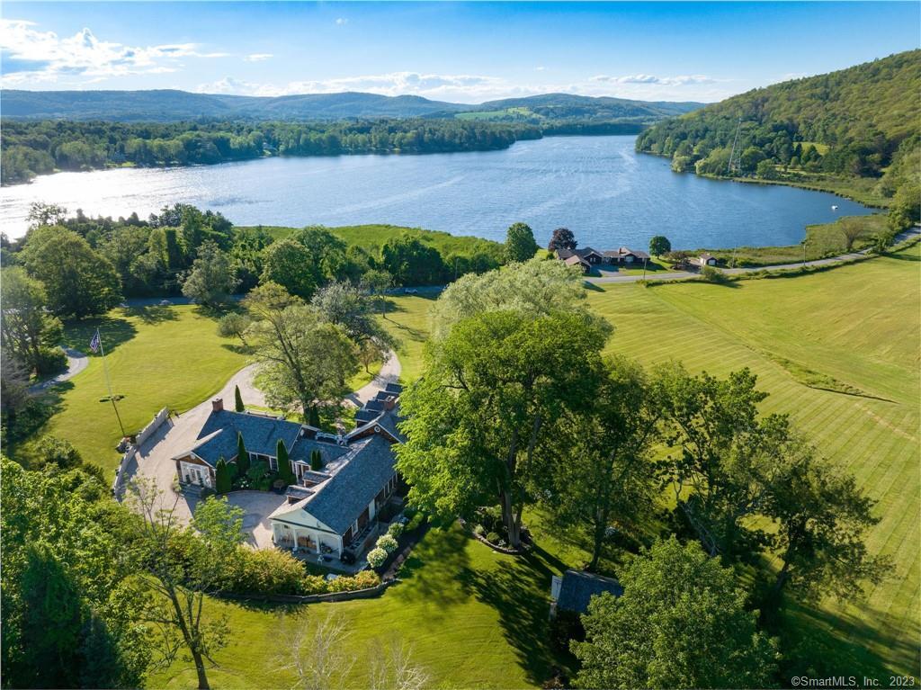 248 Millerton Road Sharon, CT 06069 - Photo 1 of 1 an aerial view of ocean with residential house with outdoor space and lake view