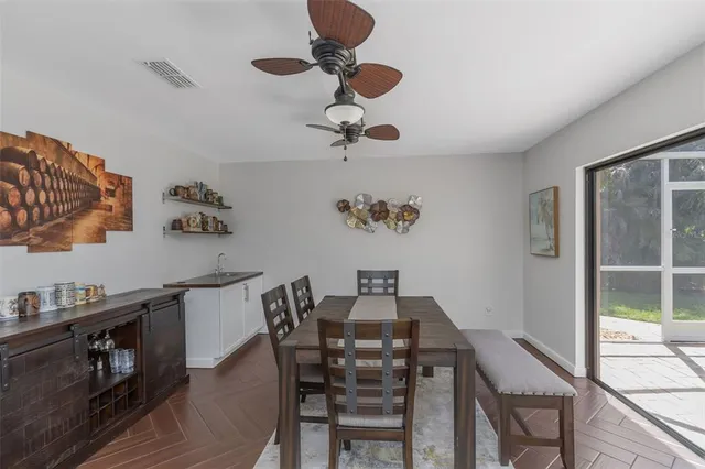 a bedroom with a bed and a lamp