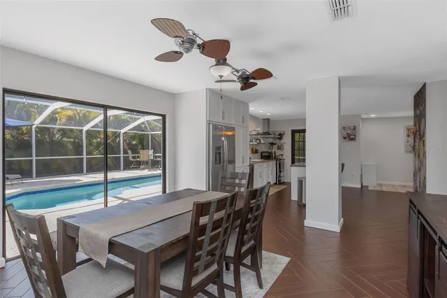 a living room with furniture rug and window