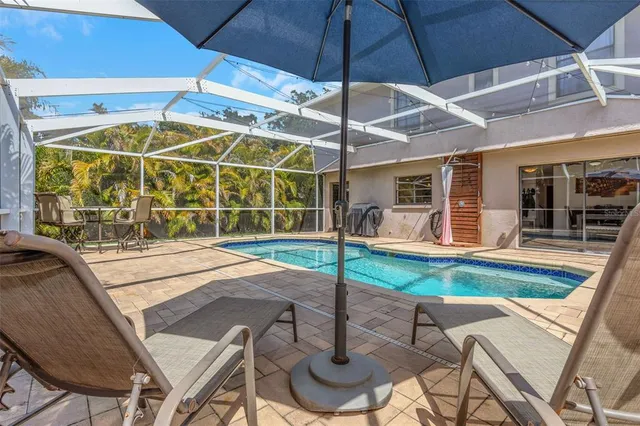 a bathroom with a double vanity sink and mirror